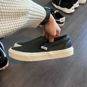 Vans black slip ons